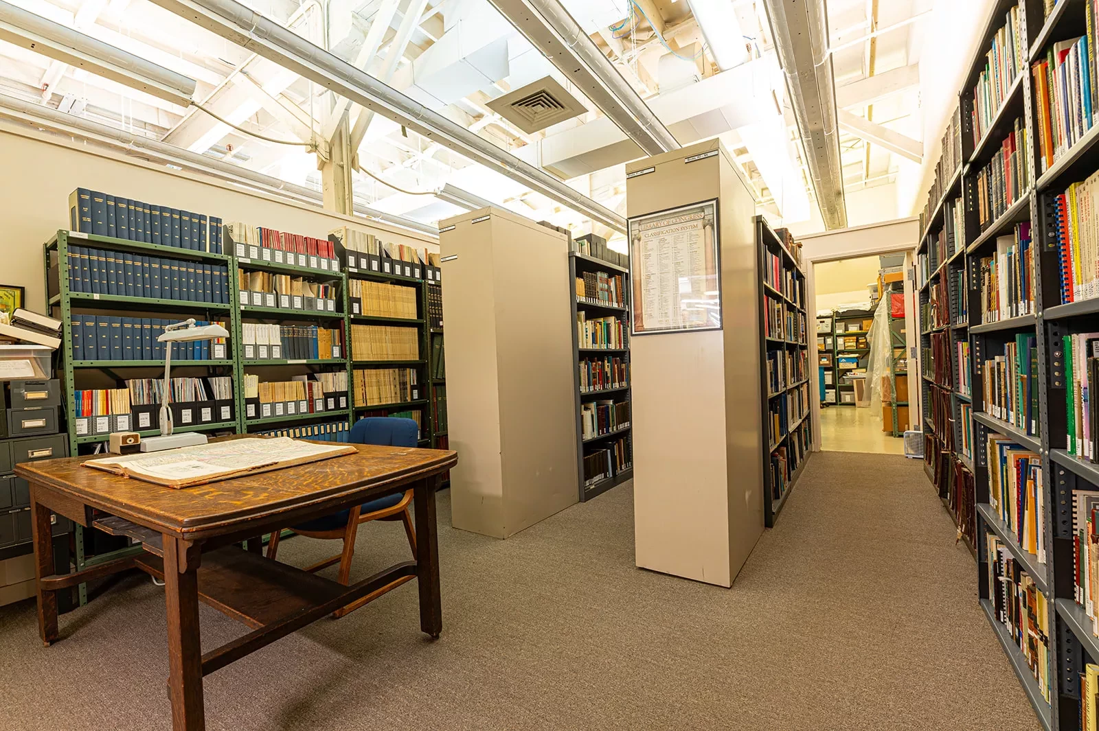 Bookcases with many books.